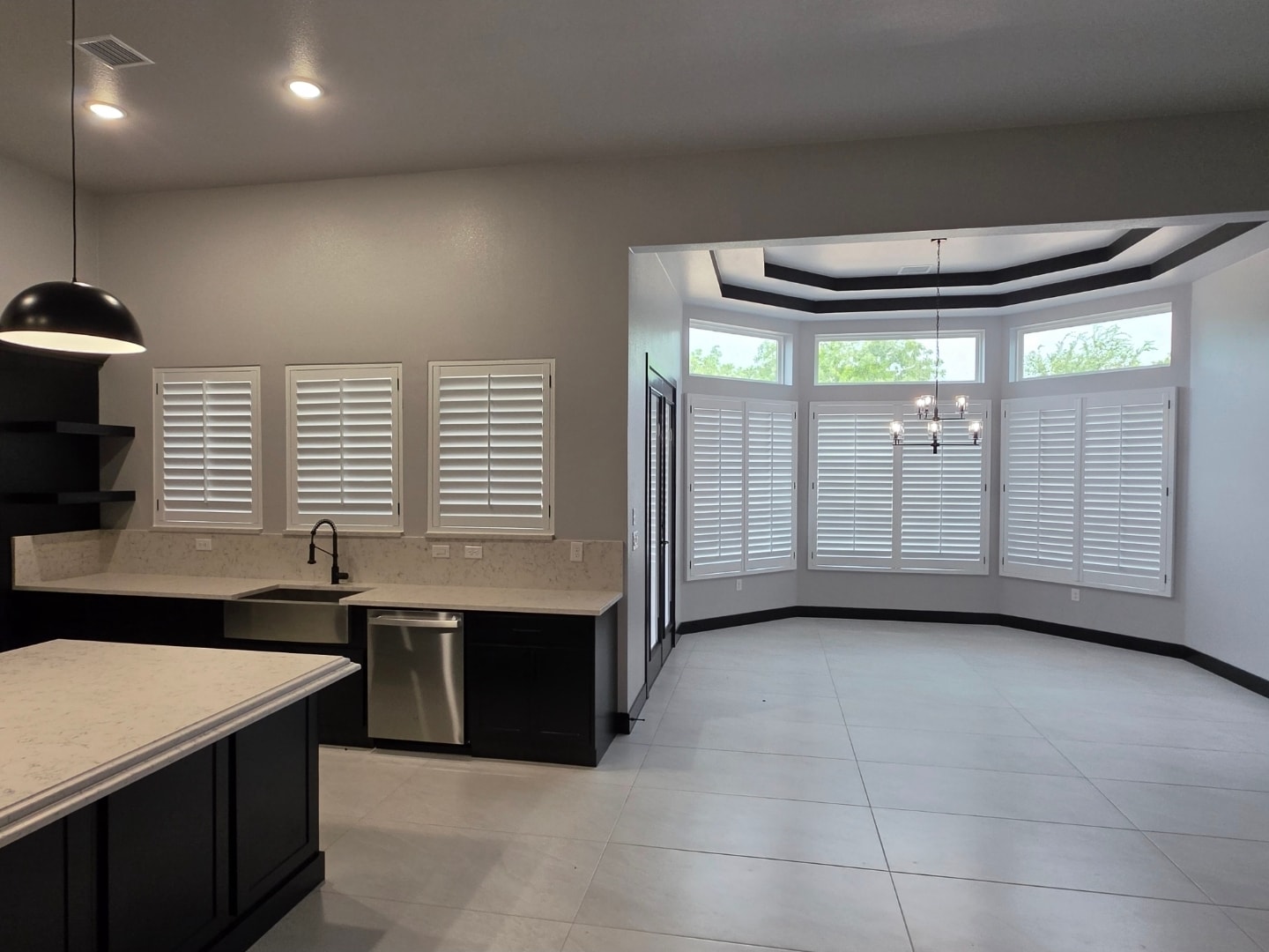 Full plantation shutter installation in kitchen and dining room