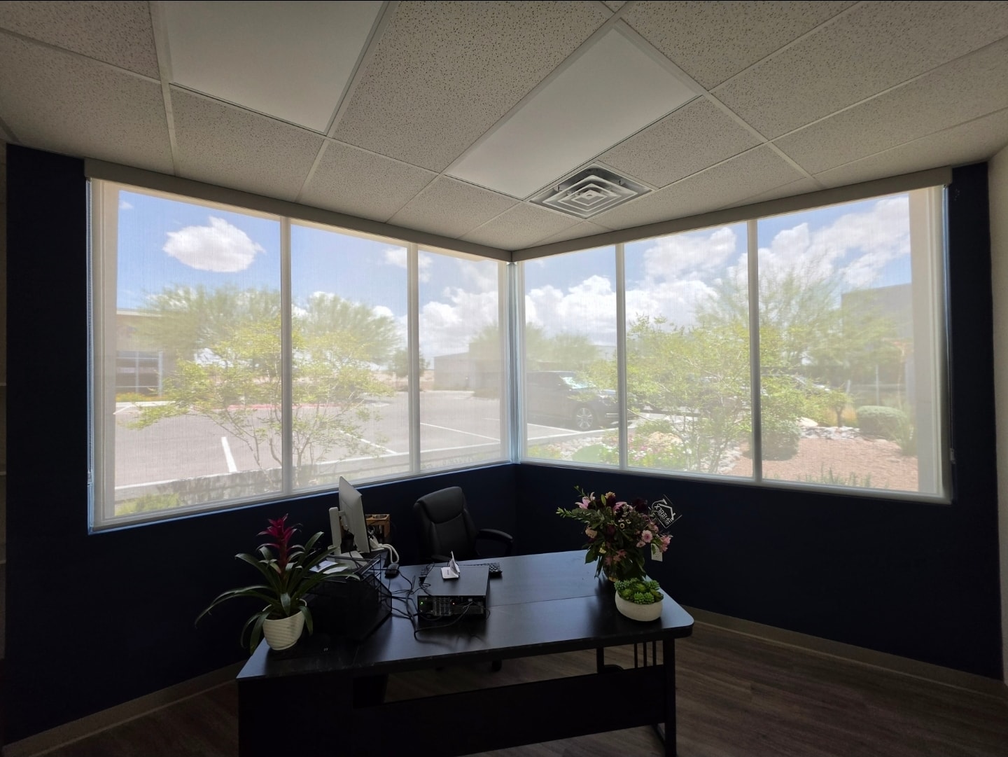Roller shades in a modern bedroom